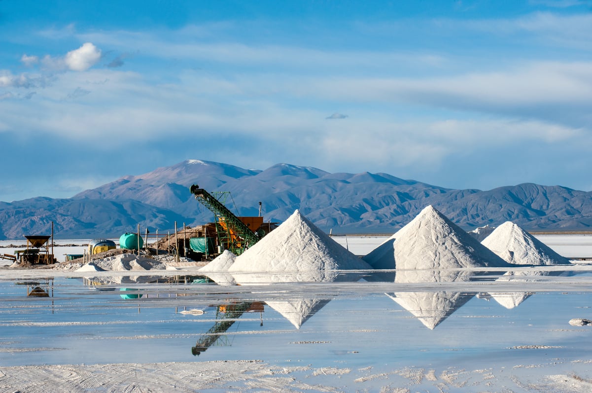 Lithium salt piles next to a brine tank.