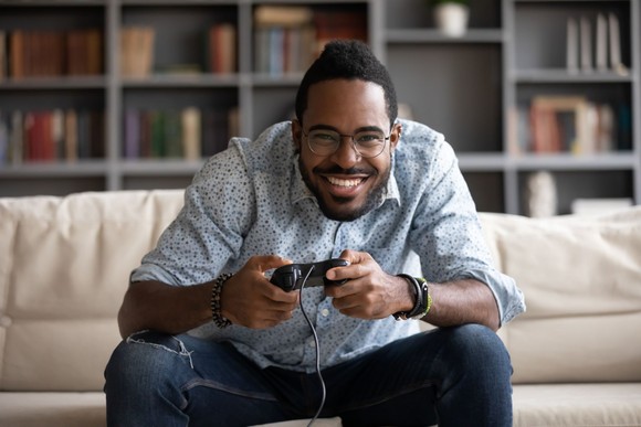 Person playing a video game.