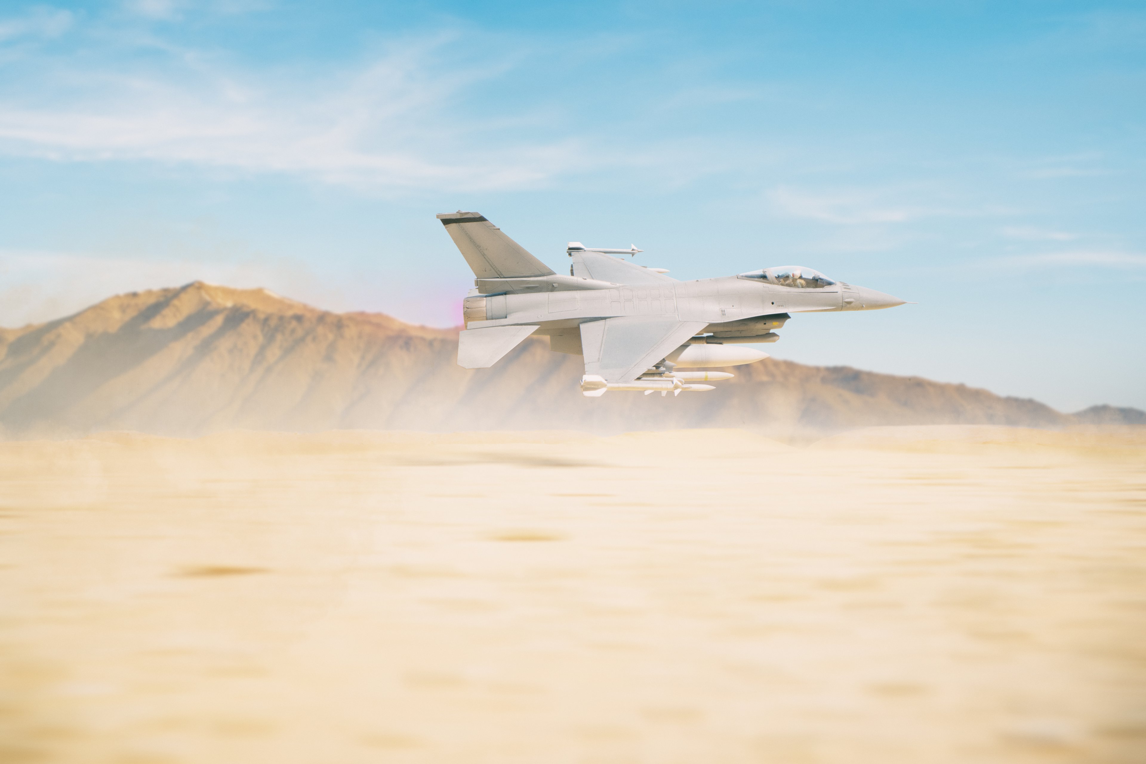 F-35 plane flies over the desert. 