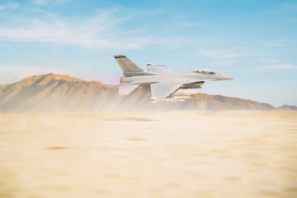 F-35 plane flies over the desert. 
