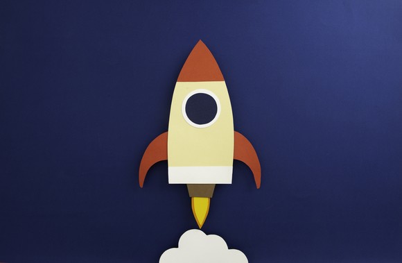 A rocket blasting upward.