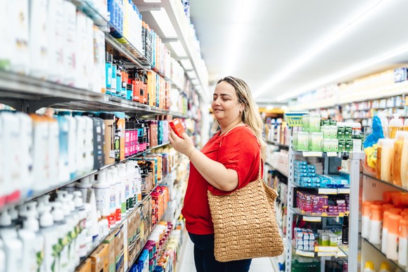 Person shopping in a drugstore.