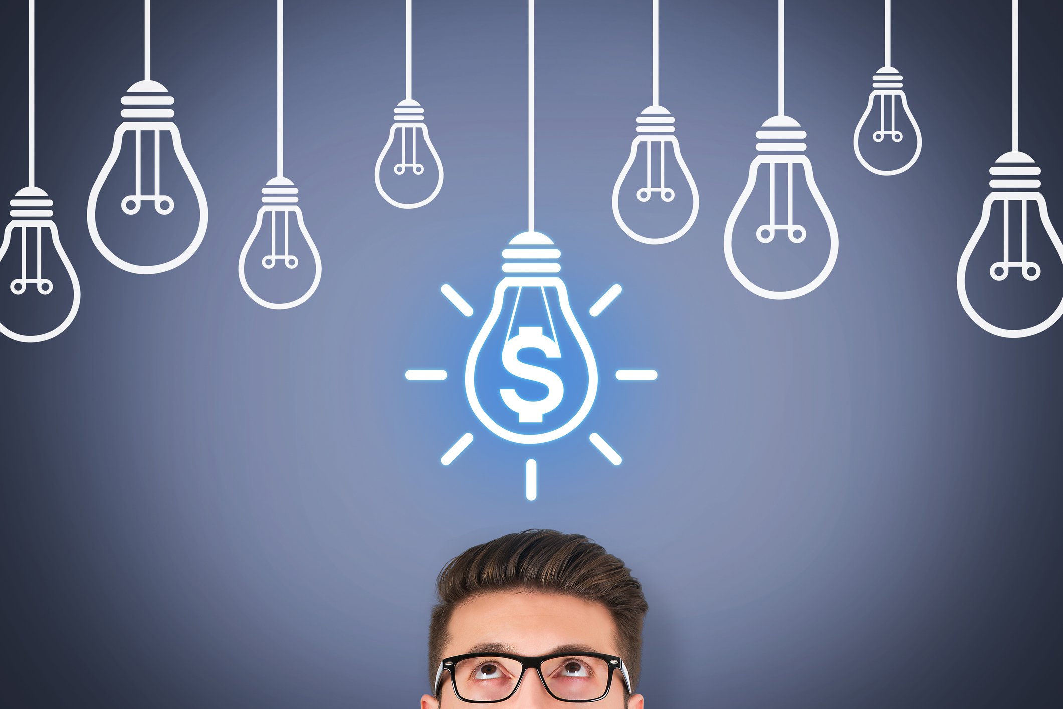 Light bulbs with dollar sign person looking up