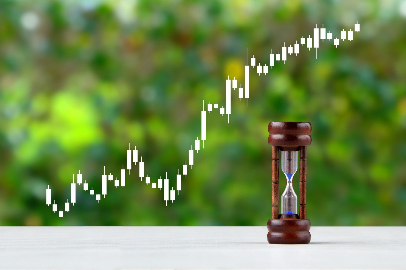 A timer and a rising stock chart.