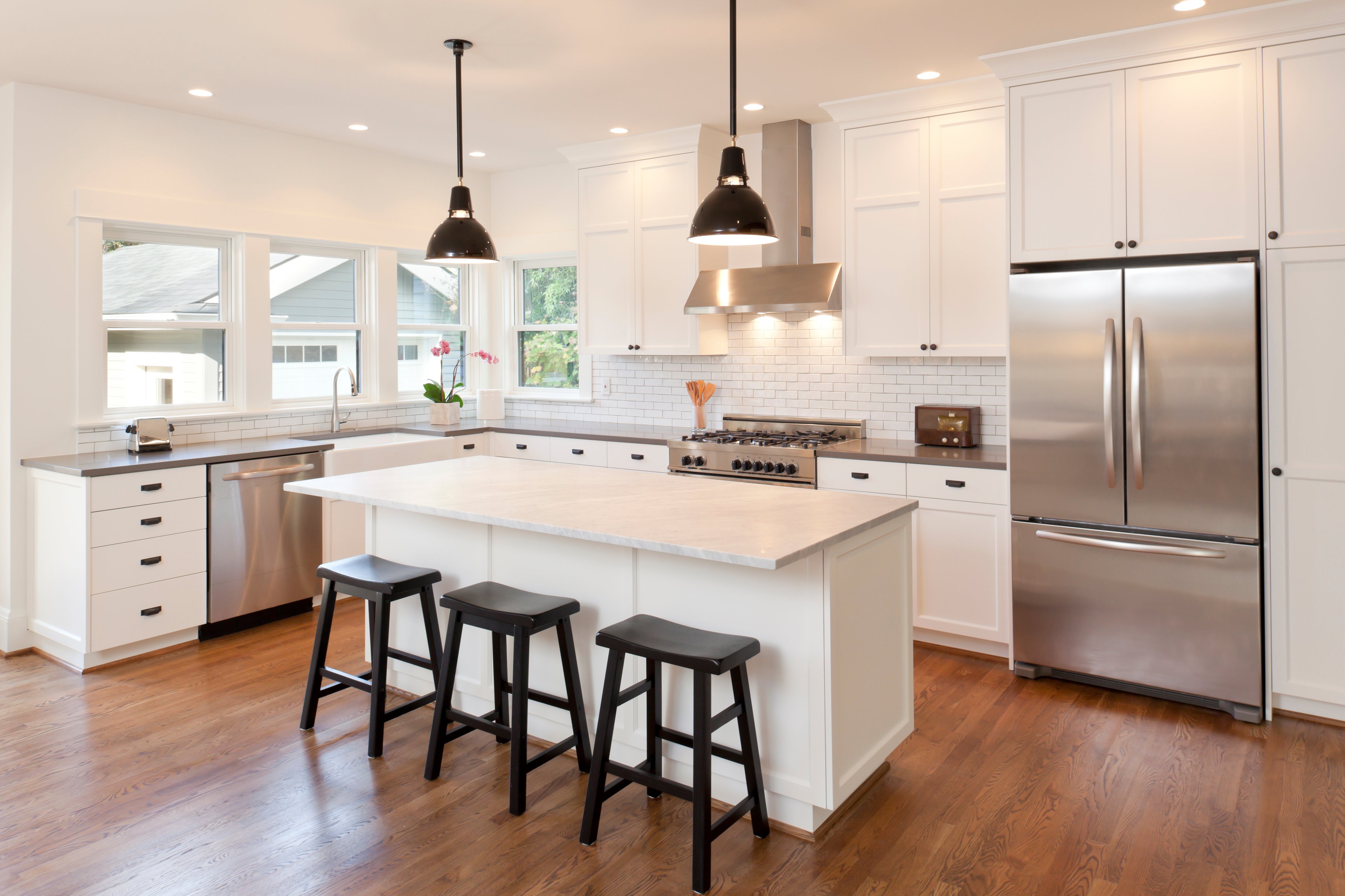 A modern kitchen full of appliances