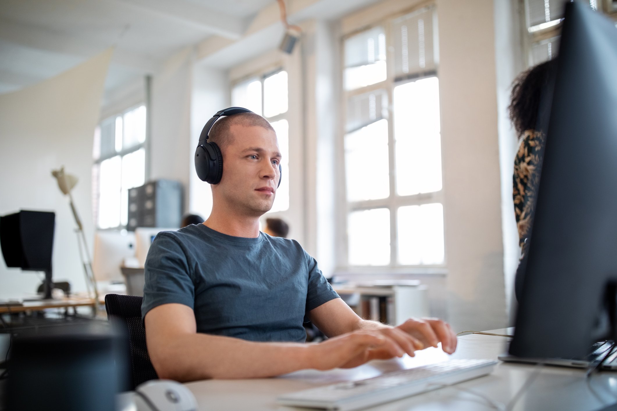 A software developer working on a computer.