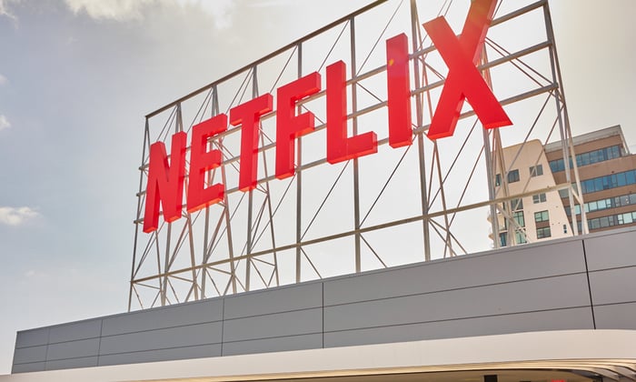 Netflix logo on top a building.
