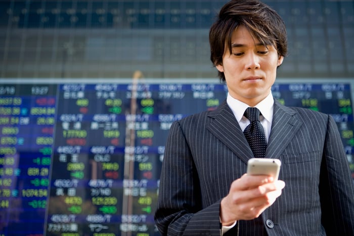 Businessman checking his phone.