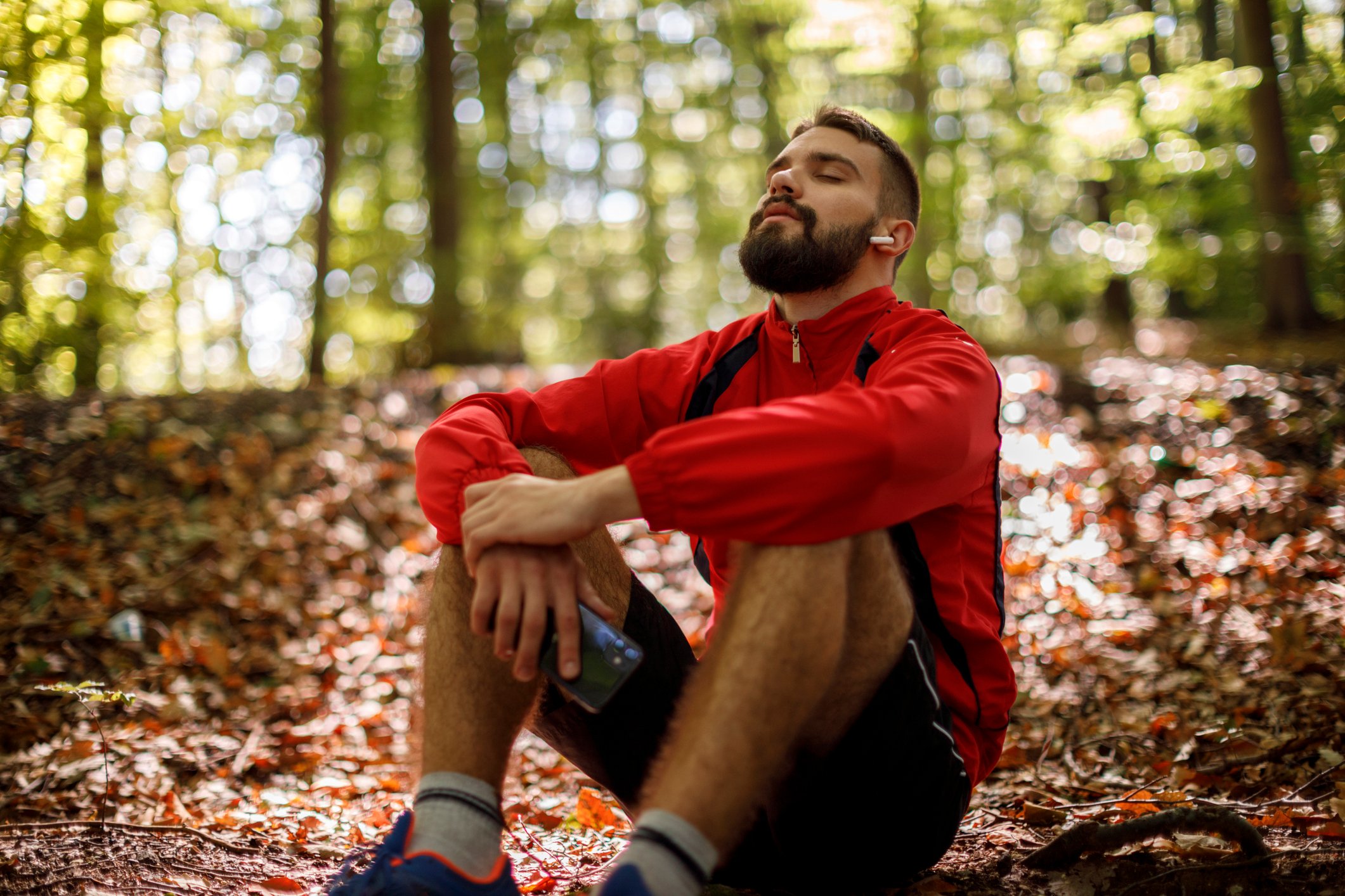 Man looking relaxed outdoors.