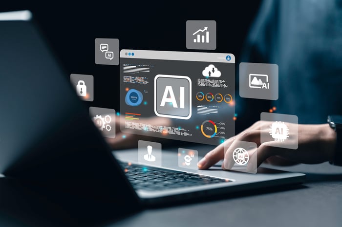 Artificial intelligence related icons float around a laptop.
