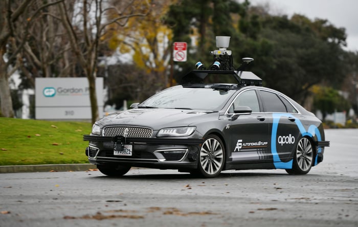 Baidu's Apollo self driving car navigating a street.