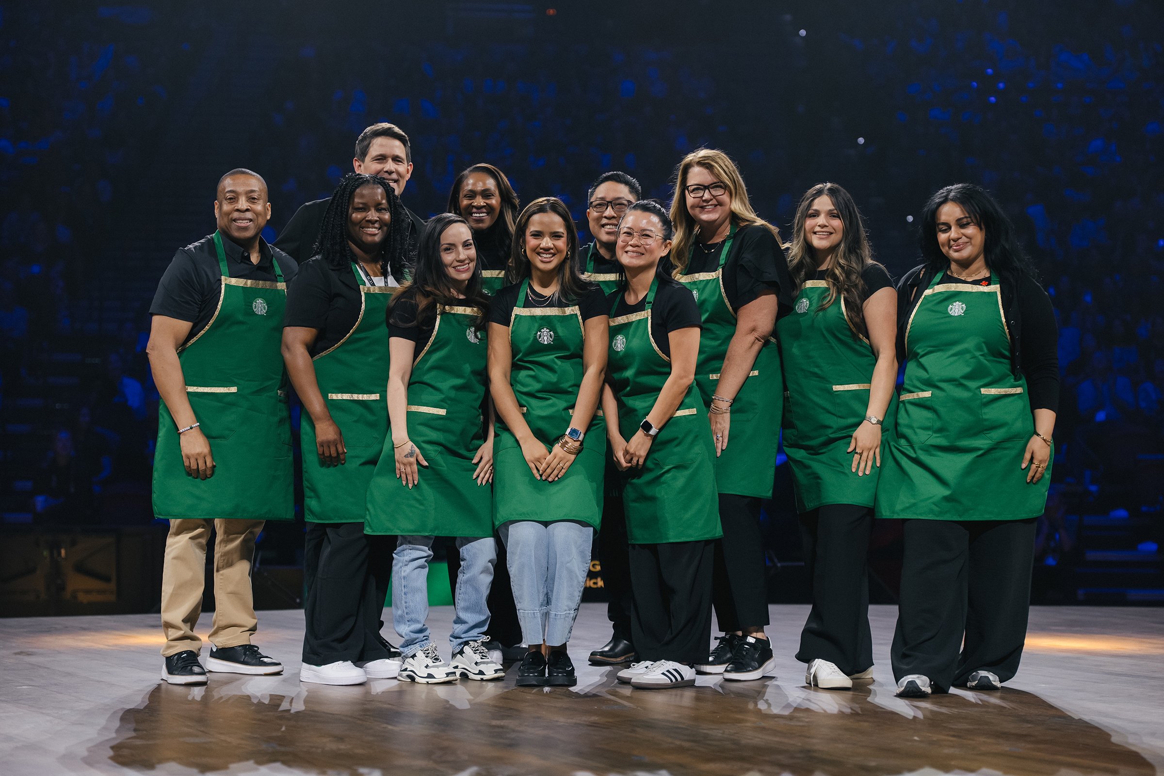 Starbucks baristas in a group photo.