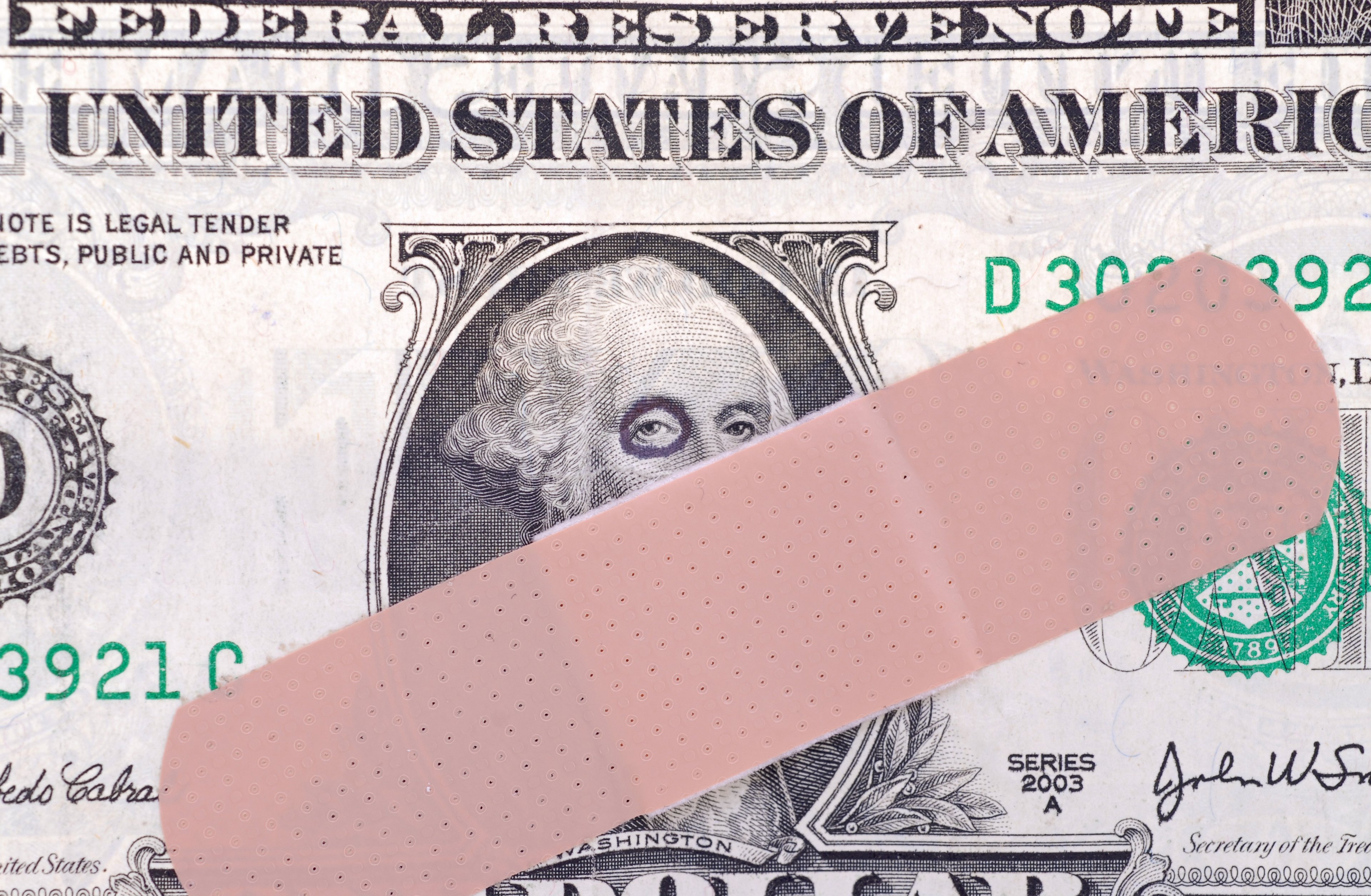 Money with bandage