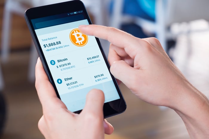 buying Bitcoin on smartphone crypto app.