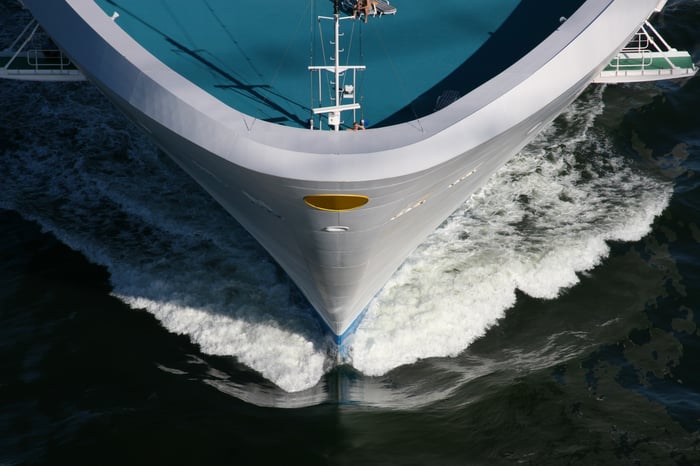 Bow of a cruise ship in the water.
