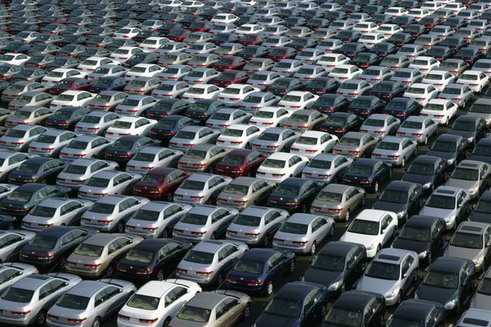 A lot full of parked cars.