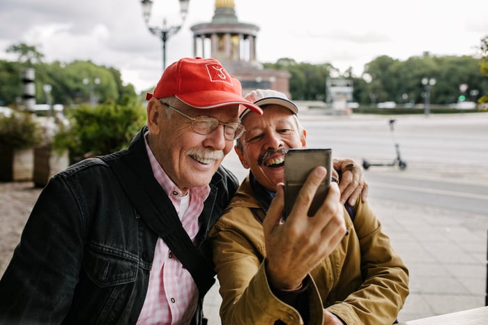 Two people taking a selfie on vacation.