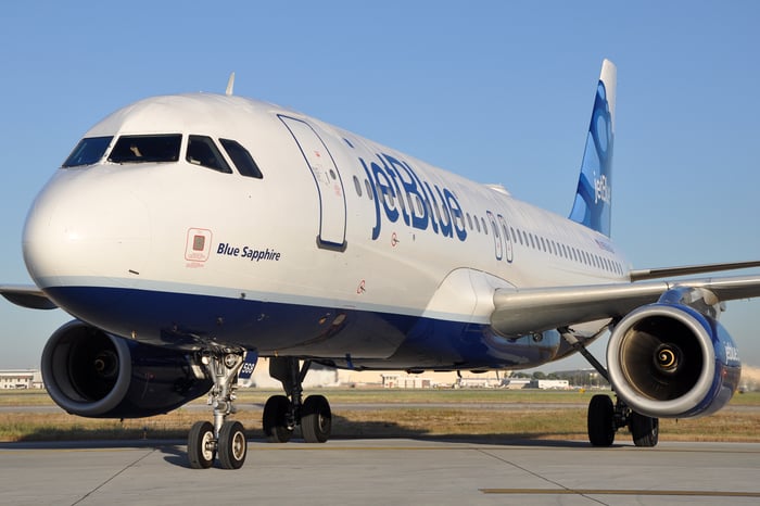 A JetBlue aircraft on the tarmac.