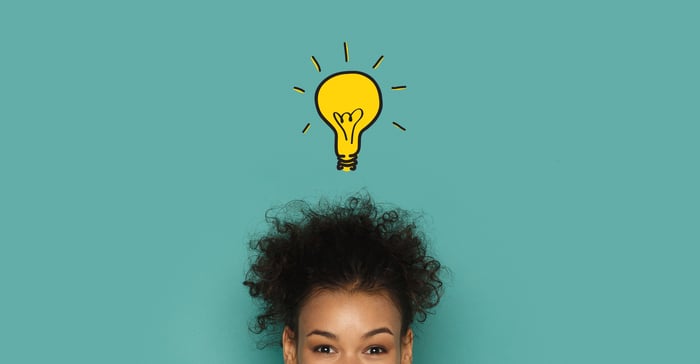 A picture of a light bulb above a person's head.