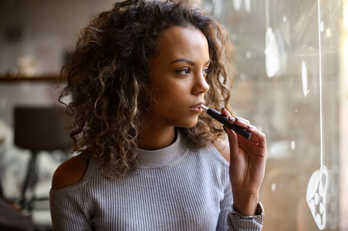 Person using a vaping product.