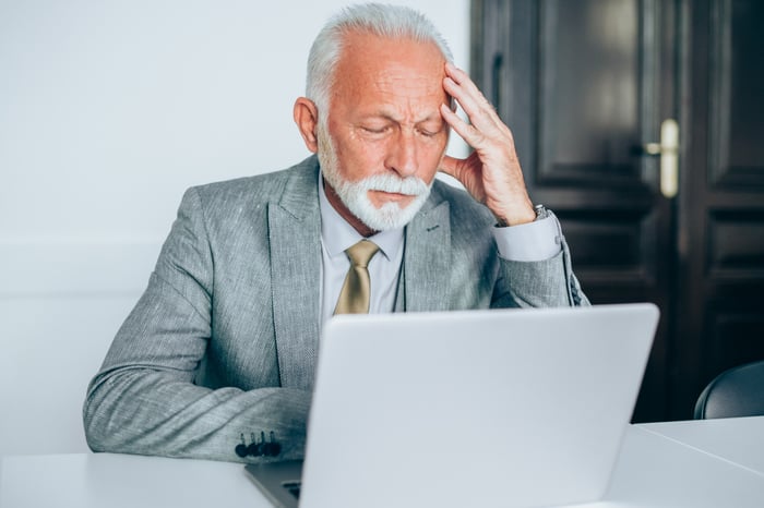A person at a laptop.