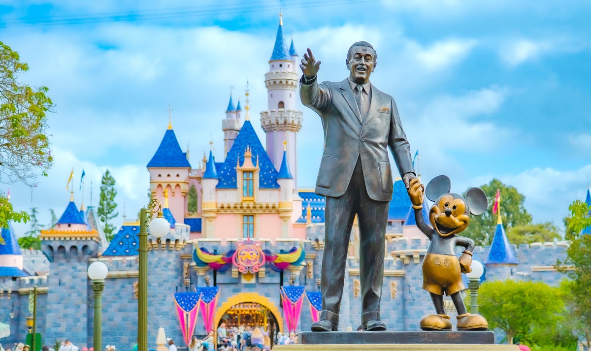A statue of Walt Disney and Mickey Mouse in front of the castle at Disneyland in California, celebrating the original resort turning 70 during the fiscal third quarter.