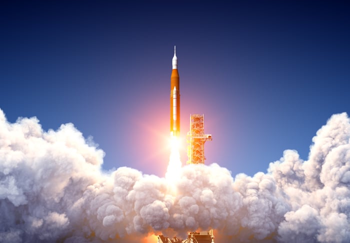 A rocket in the process of launching.