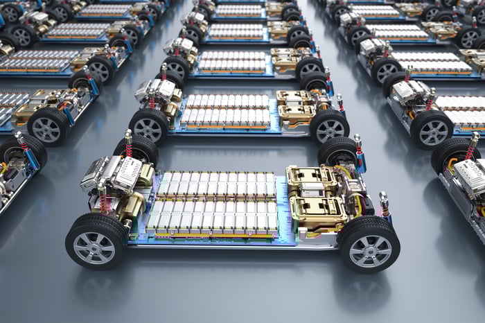 Electric vehicles with their electric motors and batteries exposed.