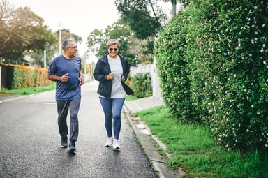 retired couple jogging exercising running