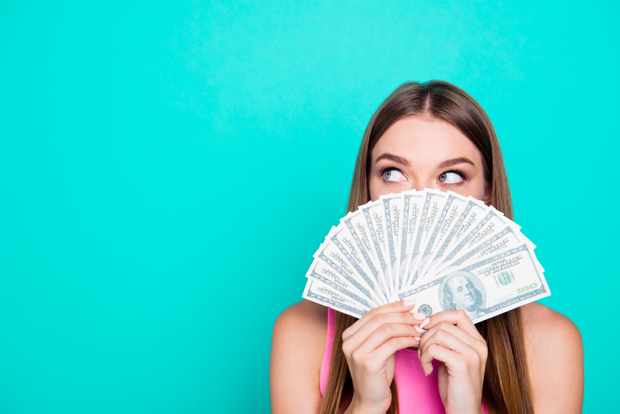 A person holding cash.