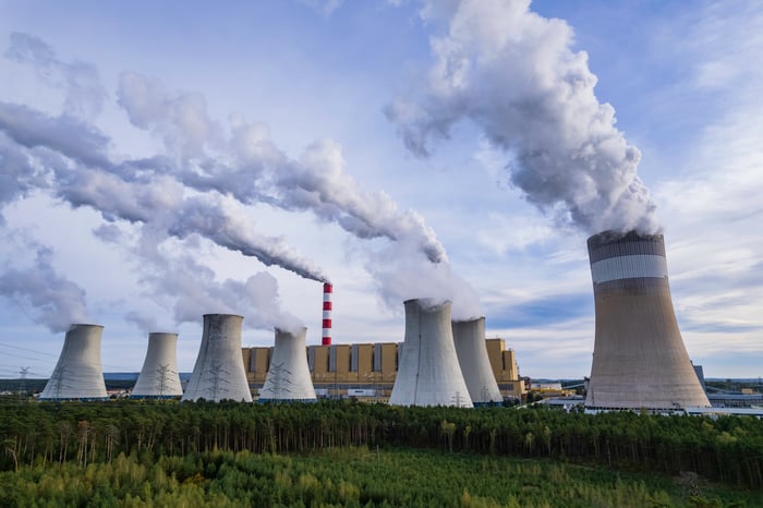 Nuclear power plant in a field.