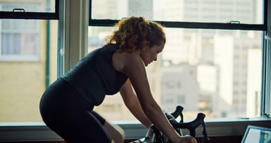 Person using an exercise bike