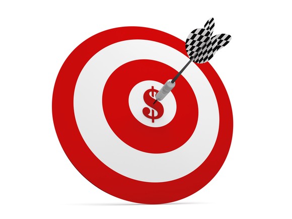A dart in a bullseye with a dollar sign in its center.