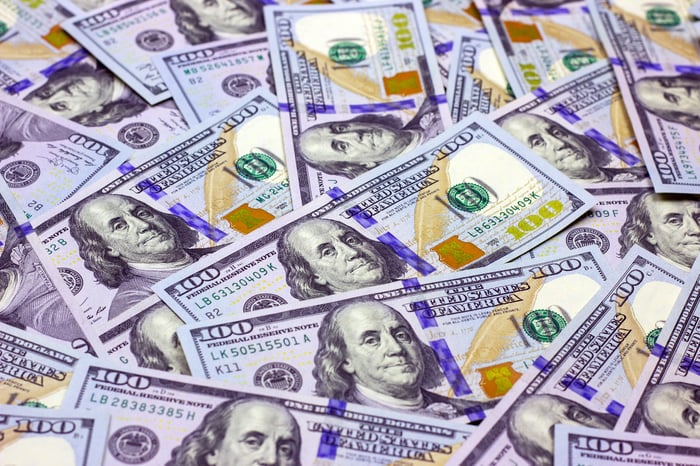 A pile of hundred-dollar bills. 