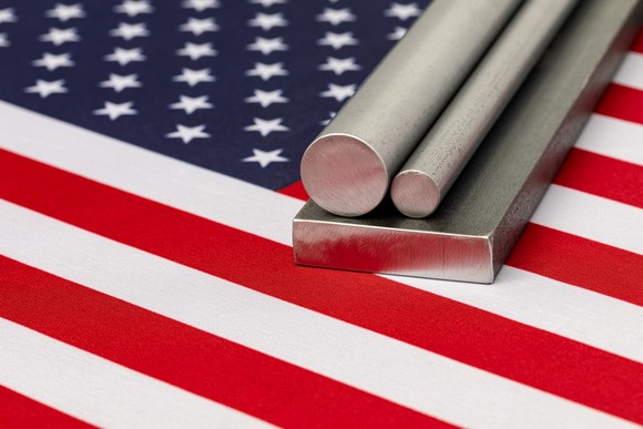 Steel bars over an American flag.