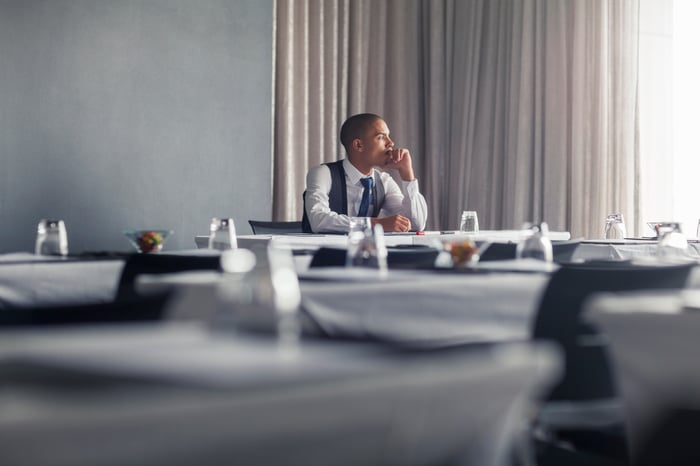 Person sitting at table.