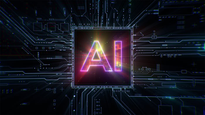 Letters A and I on a square chip. 