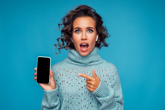 Person holding a phone.