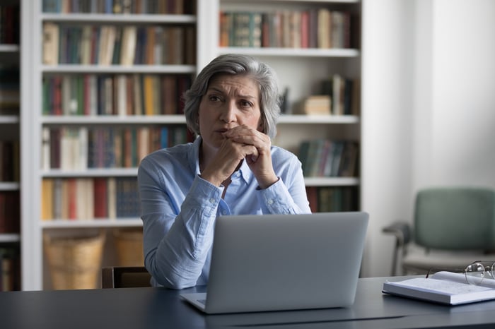 An investor ponders their next move. 