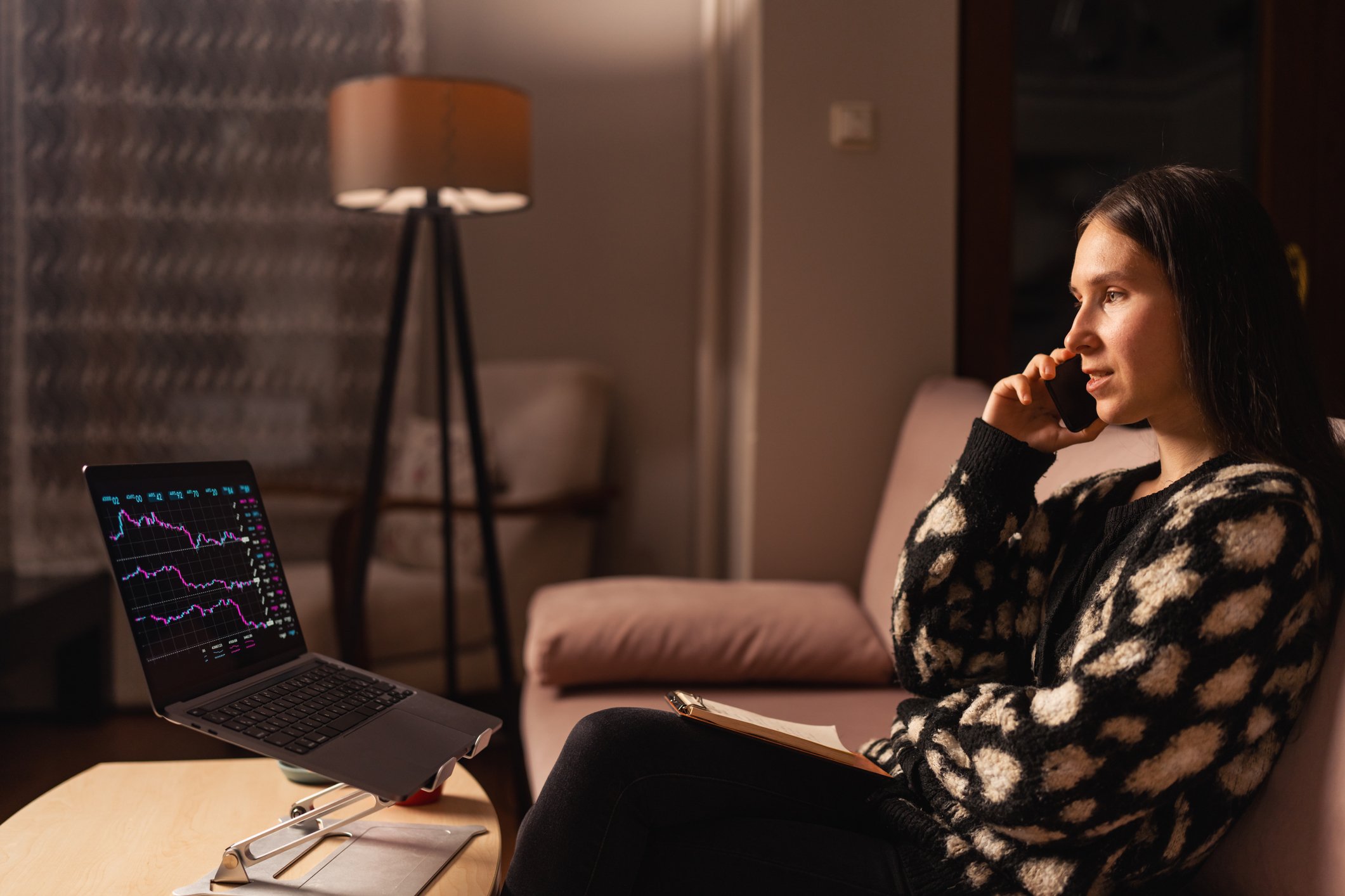 Individual investor examining stock charts.