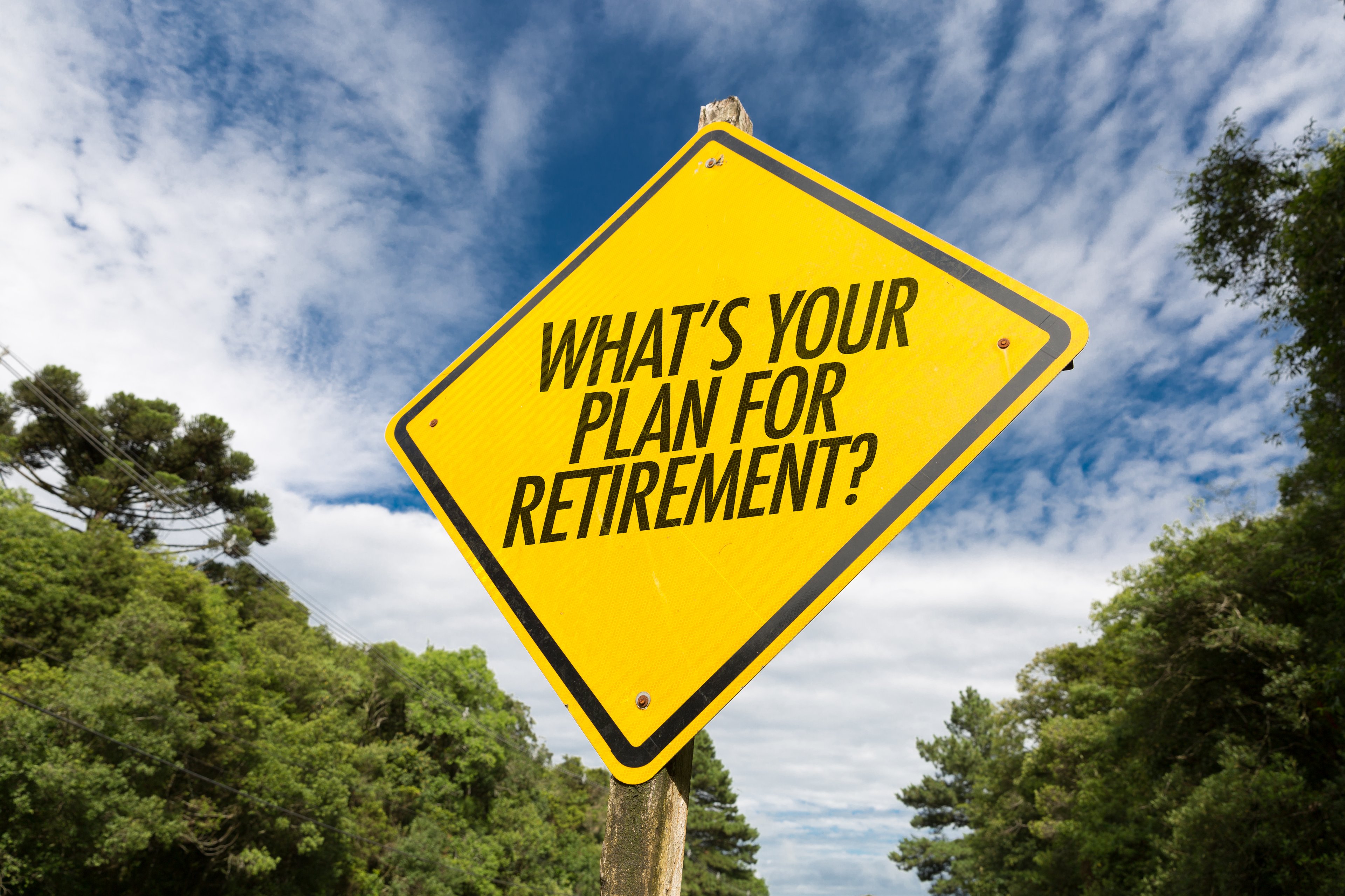 A yellow street sign says what's your plan for retirement?