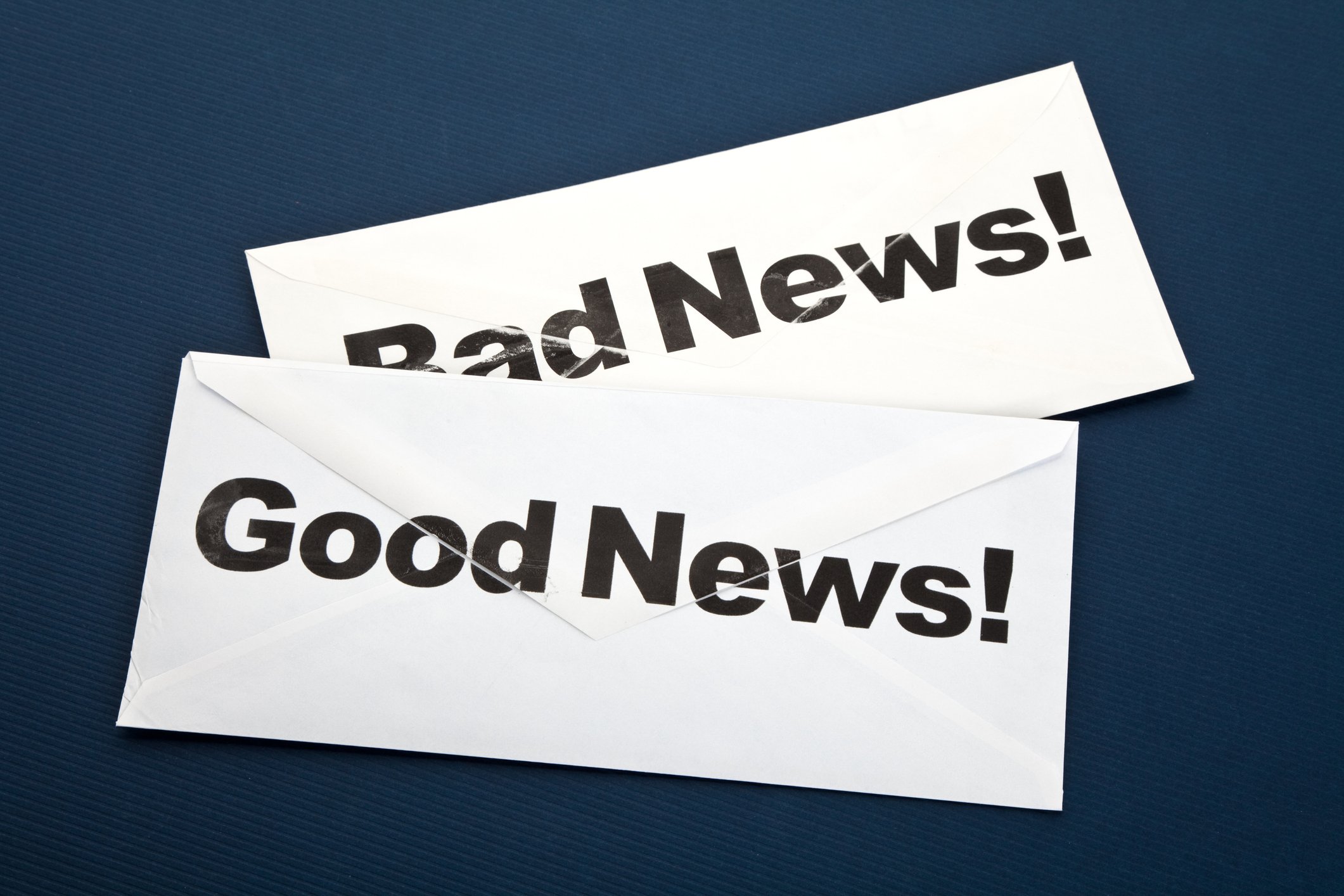 Envelopes with Good news and Bad news written on them.