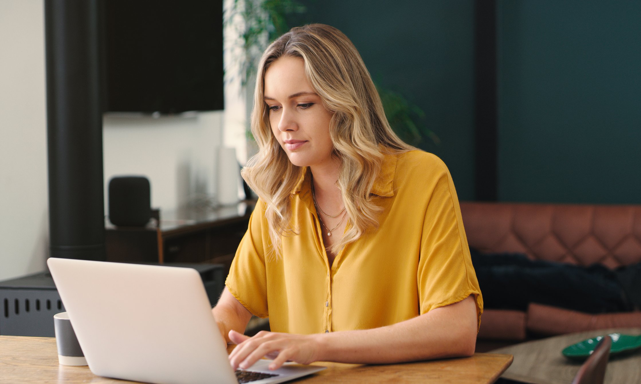 A person at a laptop.
