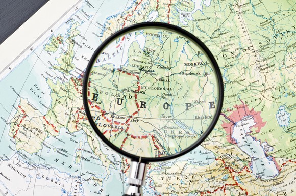 Map of Europe under a magnifying glass.