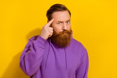 Getty - finger on head brain smart good idea