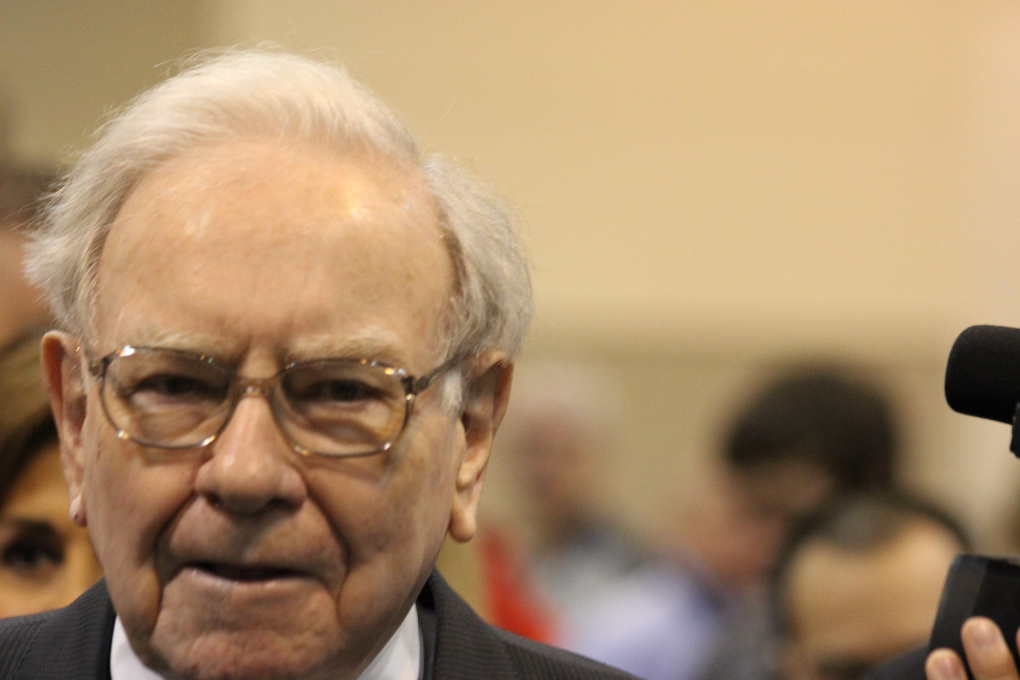 Warren Buffett with serious expression.