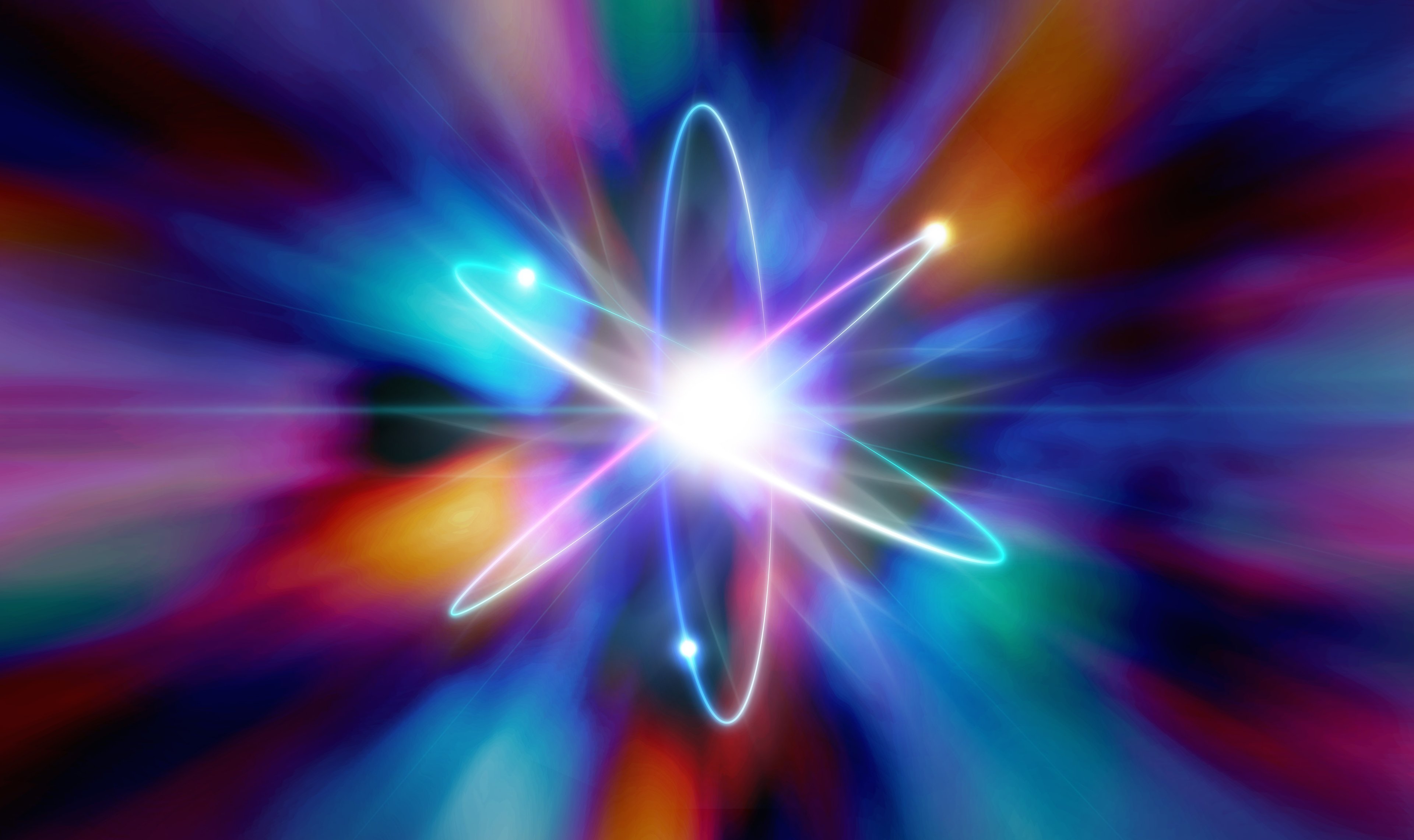 An image of a subatomic particle on a colorful background.
