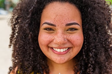 Getty - closeup of happy smiling freckled face