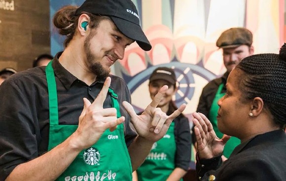 Some Starbucks employees prepare for another shift.