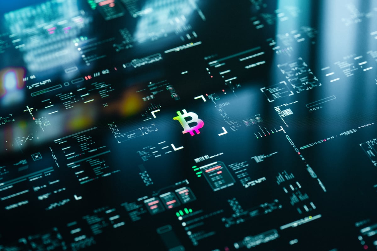 Bitcoin logo on a screen.